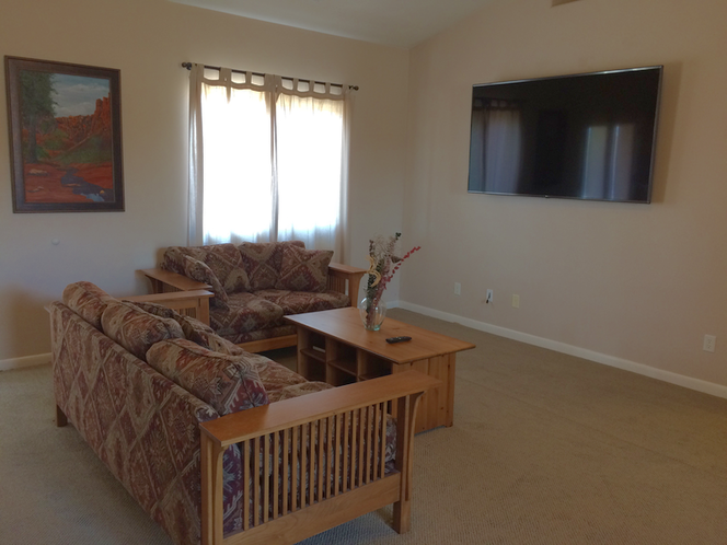 75" TV with Netflix and local programming.
